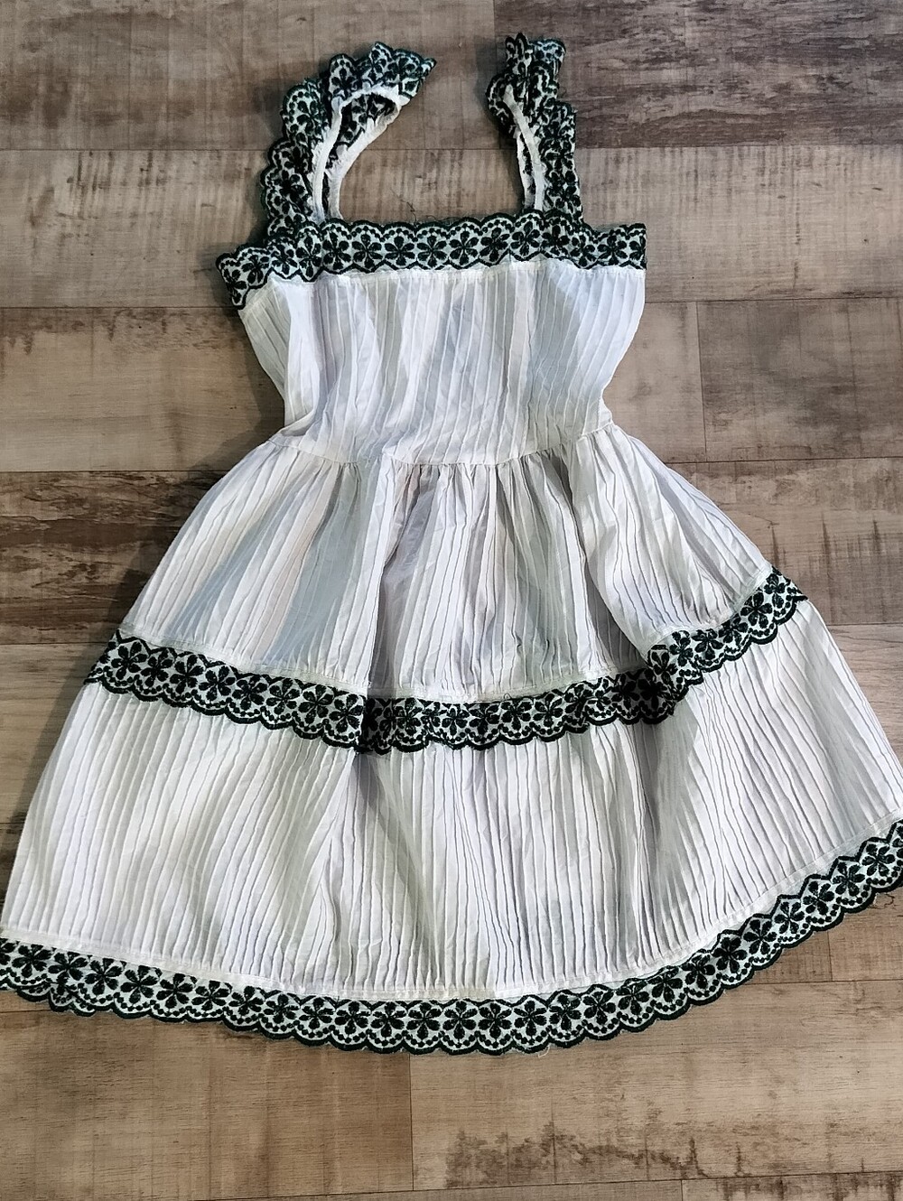 White Girls' Tiered Dress with Black Floral Trim